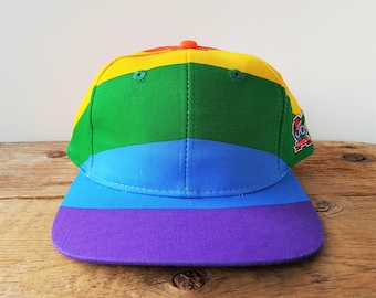 Vintage 90s RAINBOW Flag Snapback Hat GAY PRIDE 1994 Rave Deadstock Baseball Cap &#39;Somebody&#39;s Gotta Be On Top&#39; Global Caps Big Logo NwT NoS