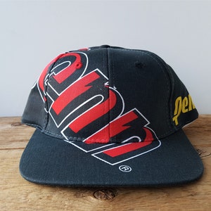 Vintage 90s PENN Tennis Ball Promo Snapback Hat Deadstock Black Big Logo Sports Flat Bill Baseball Cap by Global Caps 1998 NOS New with Tag