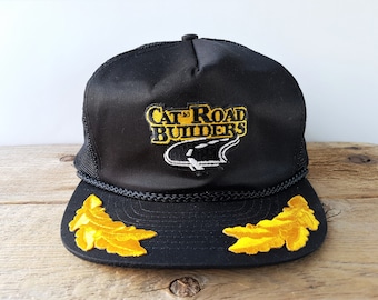 Vintage CAT ROAD BUILDERS Mesh Trucker Snapback Hat CATERPiLLAR Licensed Tonkin Inc. Promo Cap Rope Lined Golden Laurel Leaf Visor Ballcap