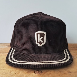 Vintage 80-tals KELTGEN Seed Company brun manchester snapback-keps tillverkad i USA majsbonde jordbruk trucker K-logotyp lapp basebollkeps bondhatt