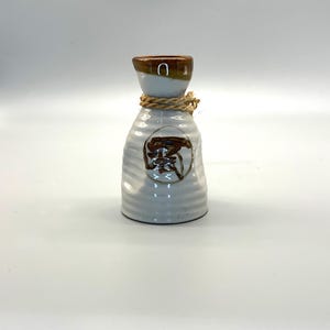 Vintage Tokkuri Japanese Sake Bottle with Japanese Calligraphy on the Front.