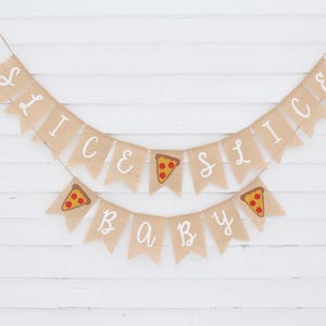 May include: A two-tiered banner made of tan burlap with white lettering and pizza slice illustrations. The top banner reads "SLICE" and the bottom banner reads "BABY". The pizza slices have red, yellow, and brown details.