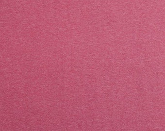 May include: A close-up of a solid pink fabric with a textured, slightly grainy surface.