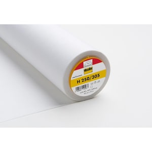 May include: A white roll of Vlieseline H 250/305 interfacing fabric. The label is yellow with black text and a barcode. The label reads "60% PES, 40% Cellulose, 90 cm x 25 m".