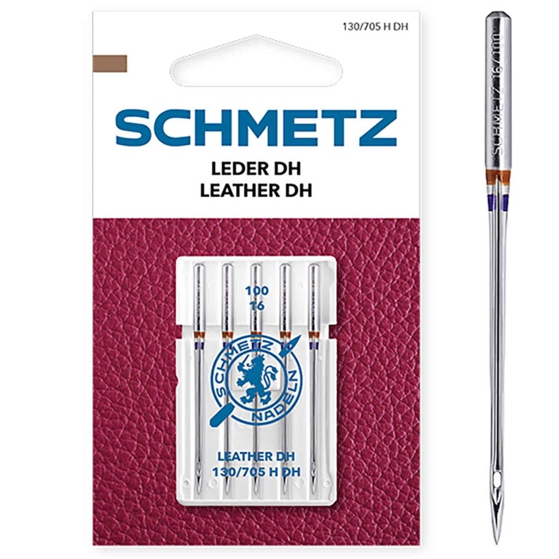 May include: A pack of 4 silver sewing needles for leather, labeled "SCHMETZ LEDER DH LEATHER DH 130/705 H DH 100 16".