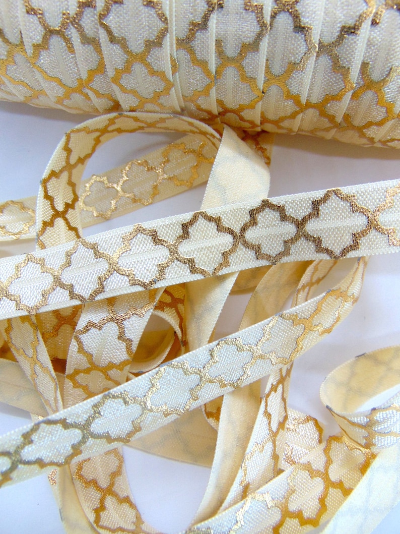 Flat Sewing Supplies Fun DIY Hair Tie Making FOE 58 inch FOE Soft Printed Elastics Gold and Cream Quatrefoil Print Fold Over Elastic