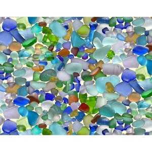 May include: A collection of smooth, frosted sea glass pieces in a variety of colors including shades of blue, green, white, brown, and purple. The small, rounded fragments are scattered across the frame, displaying translucent and opaque textures.