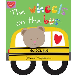 May include: A children's book cover featuring a yellow school bus with a bear face in the window and a red heart. The title "The Wheels on the Bus" is in colorful letters against a green background. The author's name is at the bottom.