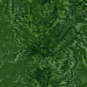May include: A close-up of a green fabric with a textured, mottled pattern. The fabric features varying shades of green, creating a layered effect. The design resembles organic shapes, possibly leaves or foliage, adding depth and visual interest.