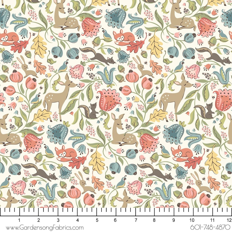 May include: A cream-colored fabric featuring a repeating pattern of woodland creatures and floral elements. The design includes deer, foxes, squirrels, rabbits, and birds, along with stylized flowers and leaves. The fabric has a whimsical, illustrated style.