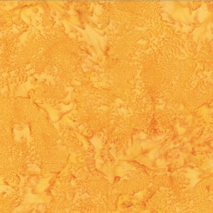 May include: A piece of fabric featuring a vibrant golden-yellow batik pattern. The design displays a mottled, textured appearance with varying shades of orange and yellow, creating an organic, cloud-like effect across the entire surface of the textile.