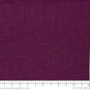 May include: A fabric with a deep purple background scattered with small, white dots. The fabric has a ruler along the bottom edge, with the text "www.GardensongFabrics.com" and a phone number. The fabric is from Ink and Arrow Fabrics.