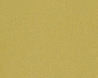 May include: A solid, textured background in a warm, golden-yellow hue. The surface has a subtle, granular appearance, creating a shimmering effect. The overall aesthetic is simple and elegant.