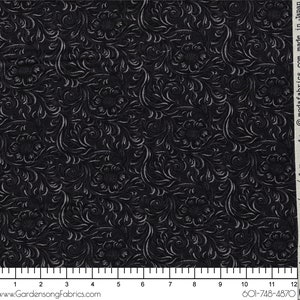 May include: Black fabric with a white embossed floral pattern. The fabric has a textured, tooled leather look.
