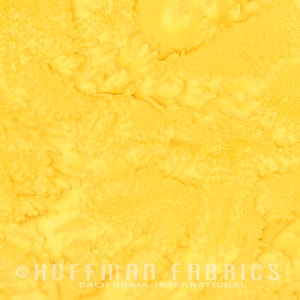 May include: A yellow fabric with a marbled pattern. The fabric has a subtle, light yellow color with darker yellow streaks throughout.