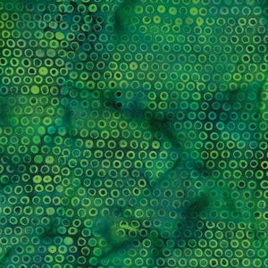 May include: Green fabric with a repeating pattern of light green circles with dark green outlines. The fabric has a mottled, tie-dye effect.