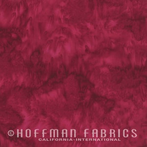 May include: A close-up of a deep red fabric with a marbled, tie-dye pattern. The fabric is soft and has a subtle sheen. The text "HOFFMAN FABRICS CALIFORNIA-INTERNATIONAL" is visible at the bottom of the image.