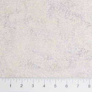 May include: White fabric with a subtle, light purple and yellow floral pattern. The fabric has a soft, textured feel.