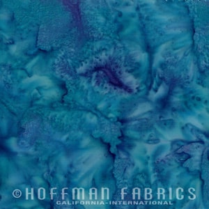 May include: Abstract blue and purple batik fabric with a swirling, marbled pattern.