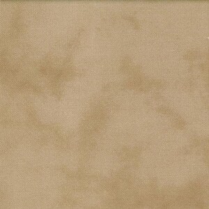 May include: A close-up of a tan fabric with a textured weave. The fabric has a mottled appearance with lighter and darker areas, creating a subtle, aged effect. The material appears to be a natural fiber, possibly linen or cotton.