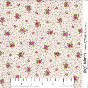 May include: White fabric with a repeating pattern of small pink and green floral bouquets. The fabric is covered in tiny pink dots. A ruler is included in the image with measurements in inches.