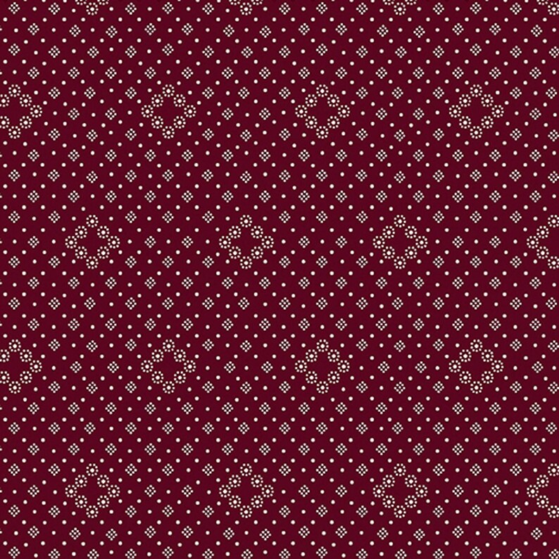 May include: A seamless pattern featuring a deep burgundy background with a repeating design of small white dots and diamond-shaped floral patterns. The design is symmetrical and creates a visually appealing texture.