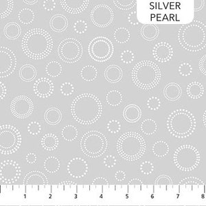 May include: A gray fabric with a white circle pattern. The circles are made up of small white dots.
