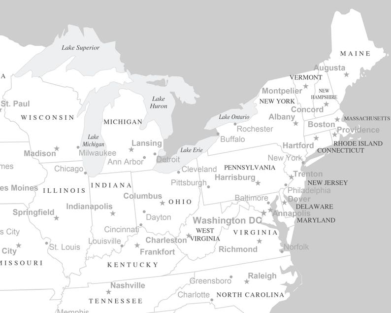 May include: A grayscale map of the northeastern United States, highlighting states and major cities. The map includes labels for states like New York, Massachusetts, and Pennsylvania, as well as the Great Lakes.
