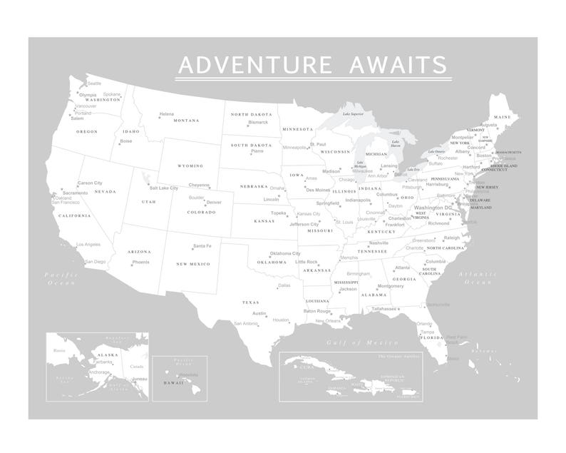 May include: A grayscale map of the United States with state names and major cities labeled. The words "ADVENTURE AWAITS" are printed at the top. Includes insets of Alaska, Hawaii, and the Caribbean islands.