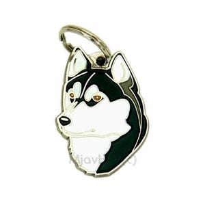 May include: A metal pet tag featuring a detailed illustration of a Husky dog's head. The tag has a silver-colored ring for attachment. The dog's face is black and white with brown eyes, and a black outline.