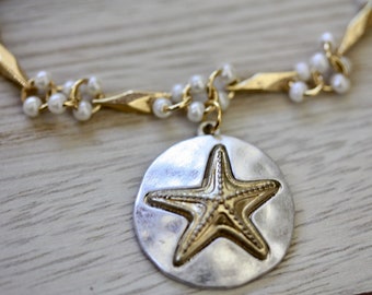 Handmade bracelet made with upcycled / repurposed vintage silver tone and gold tone starfish dangle, charm bracelet