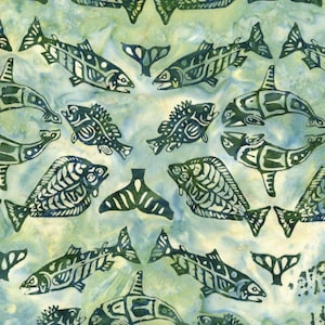 May include: A fabric pattern featuring stylized fish and whale designs in shades of green and blue. The repeating pattern includes various fish shapes, whale tails, and orca-like figures, creating a marine theme.