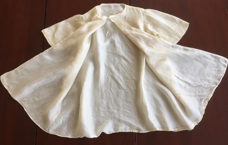Vintage silk lined cream colored layette robe infant gown embroidery ribbon ties c1940