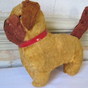 Antique vintage plush gold and brown hard stuffed toy dog glass eyes red oil cloth collar up for adoption