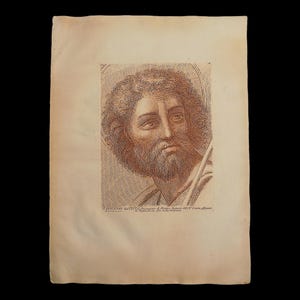 May include: A vintage black and white engraving of a man's face. The man has a beard and is looking to the right. The engraving is titled "S. GIOVANNI BATTISTA" and is from the "Opera di Messer Simone Memmi" collection.