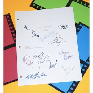 May include: A white sheet of paper with multiple signatures in blue, black, and purple ink. The signatures include "Alice Tegan", "Connie Britton", "Jeff Goldblum", "Key", "L.C.  Mander", and "Zoe" . The text "'Friday Night Lights' by Peter Berg" is printed at the top of the page.