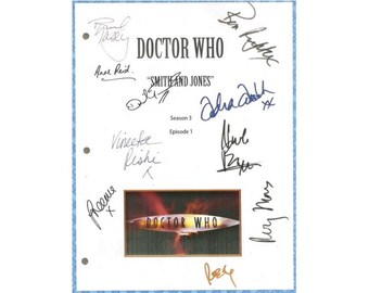 May include: A white sheet of paper with black ink signatures from the cast and crew of the Doctor Who television series. The signatures include:  "Anne Reid", "Ben Lehtyc", "Vineeta Rishi", "Rame", "May  Murs", "Mul By", "Jasey", and "Doctor Who" in a black font. The text "Smith and Jones" is printed in black font. The text "Season 3, Episode 1" is printed in black font. A small image of the Doctor Who logo is in the lower right corner.