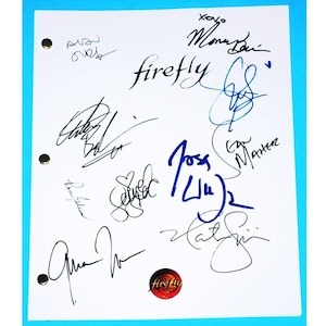 May include: A white sheet of paper with black and blue signatures from the cast of the TV show "Firefly". The signatures include "Nathan Fillion", "Alan Tudyk", "Gina Torres", "Adam Baldwin", "Jewel Staite", "Sean Maher", "Summer Glau", "Morena Baccarin", "Ron Glass", "and "Firefly" in a circle.