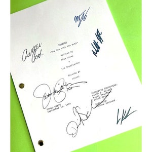 May include: A white script with the title "FRIENDS" and the episode title "The One with the Butt" written on it. The script is signed by the cast members, including Courteney Cox, Jennifer Aniston, Matt LeBlanc, Lisa Kudrow, David Schwimmer, and Matthew Perry.