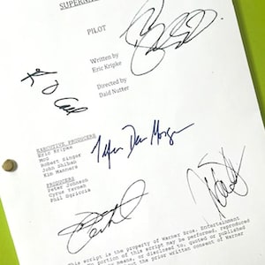 May include: A white script page for the television show "Supernatural" with multiple signatures in black ink. The script title "Pilot" is visible, along with the names of the writer, director, and executive producers.