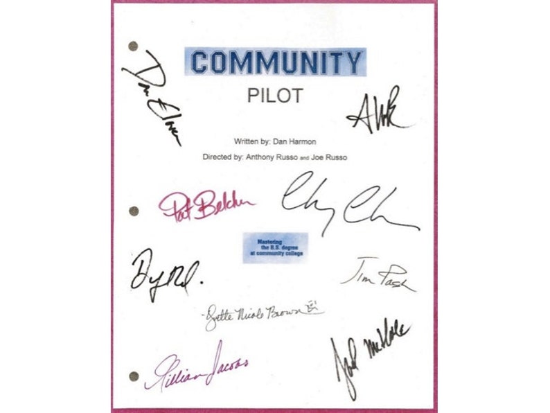 May include: A white script with the title "COMMUNITY" and "PILOT" written in blue. The script is signed by the cast and crew, including Dan Harmon, Anthony Russo, Joe Russo,  Pat Belcher, Chevy Chase, Donald Glover, Yvette Nicole Brown, Gillian Jacobs, and Joel McHale.