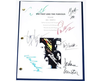 May include: A white script for "The Fast and the Furious: Redline" with multiple signatures in various colors. The script includes the film's title, the names of the writers, and a movie poster image.
