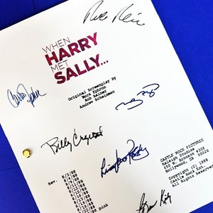 May include: A white script with the title "When Harry Met Sally..." and the names of the writers and producers. The script is signed by the actors Billy Crystal, Meg Ryan, Carrie Fisher, Bruno Kirby, and Rob Reiner.