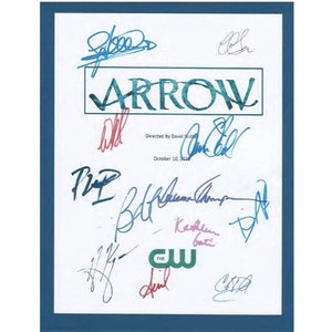 May include: A white script font title card for the TV show "ARROW" with multiple signatures in blue, red, and purple ink. The signatures include "David Nutter", "Katie Cassidy", "Stephen Amell", "Willa Holland", "Colton Haynes", "Paul Blackthorne", "Emily Bett Rickards", and "John Barrowman". The card also includes the CW logo in green and white.