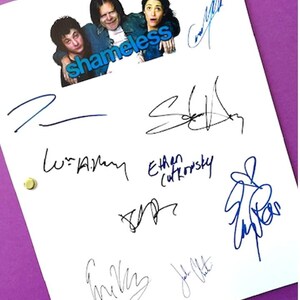 May include: A white paper with multiple signatures in blue and black ink. The top left corner features a color image of three people with the word "shameless" in blue. Gold brads secure the paper.