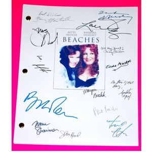 May include: A white script with the title "BEACHES" and a photo of Bette Midler and Barbara Hershey. The script is signed by Bette Midler, Barbara Hershey,  and other cast members including  Edna  Mentr,  Mayim Bialik,  and  Phil  Lewis.