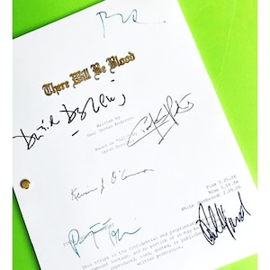May include: A white script for the movie "There Will Be Blood" with several signatures, including those of Paul Thomas Anderson, Daniel Day-Lewis, and Kevin J. O'Connor. The script is marked "Pink 7.25.06, Blue 5.16.06, Unnumbered 2.20.06".