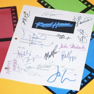 May include: A white script page from the movie "Road House" with signatures from the cast and crew, including Patrick Swayze, Kelly Lynch, and Sam Elliott. The page is dated May 1989.