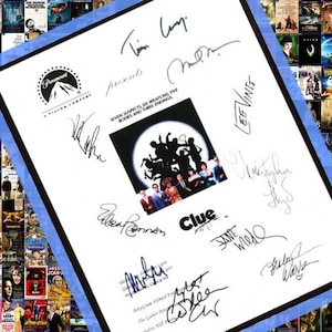 May include: A white poster with a blue border featuring the Paramount Pictures logo and the title "Clue". The poster is signed by the cast members, including Tim Curry, Madeline Kahn, Christopher Lloyd, Michael McKean, Martin Mull, Lesley Ann Warren, Eileen Brennan, and others. The poster also includes the tagline "Seven Suspects, Six Weapons, Five Bodies and Three Endings."
