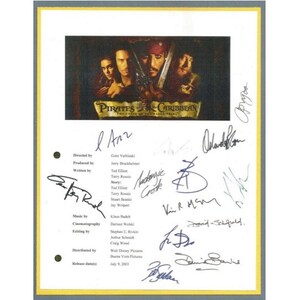 May include: A white sheet of paper with a black and white photo of Johnny Depp as Captain Jack Sparrow from the movie Pirates of the Caribbean: The Curse of the Black Pearl. The paper has the movie title and credits, and is signed by the cast and crew.